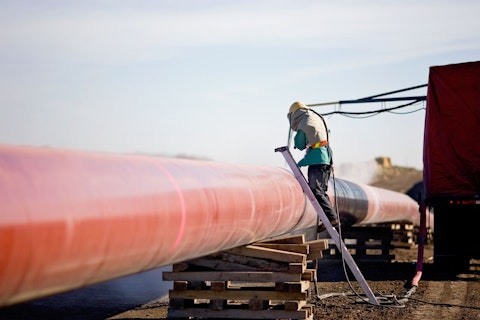 Technician Working on Pipeline